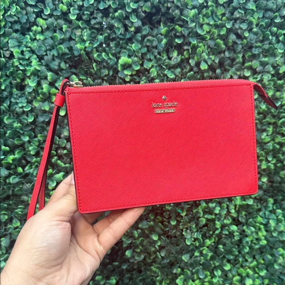 kate spade Handbags - Kate Spade Vibrant Red Wristlet